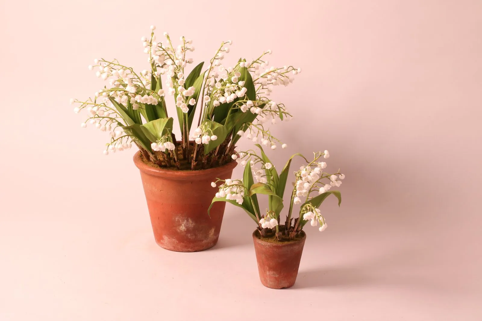 Lily of the valley — botanical sculpture in porcelain and hand-painted copper by Faja Schroeder